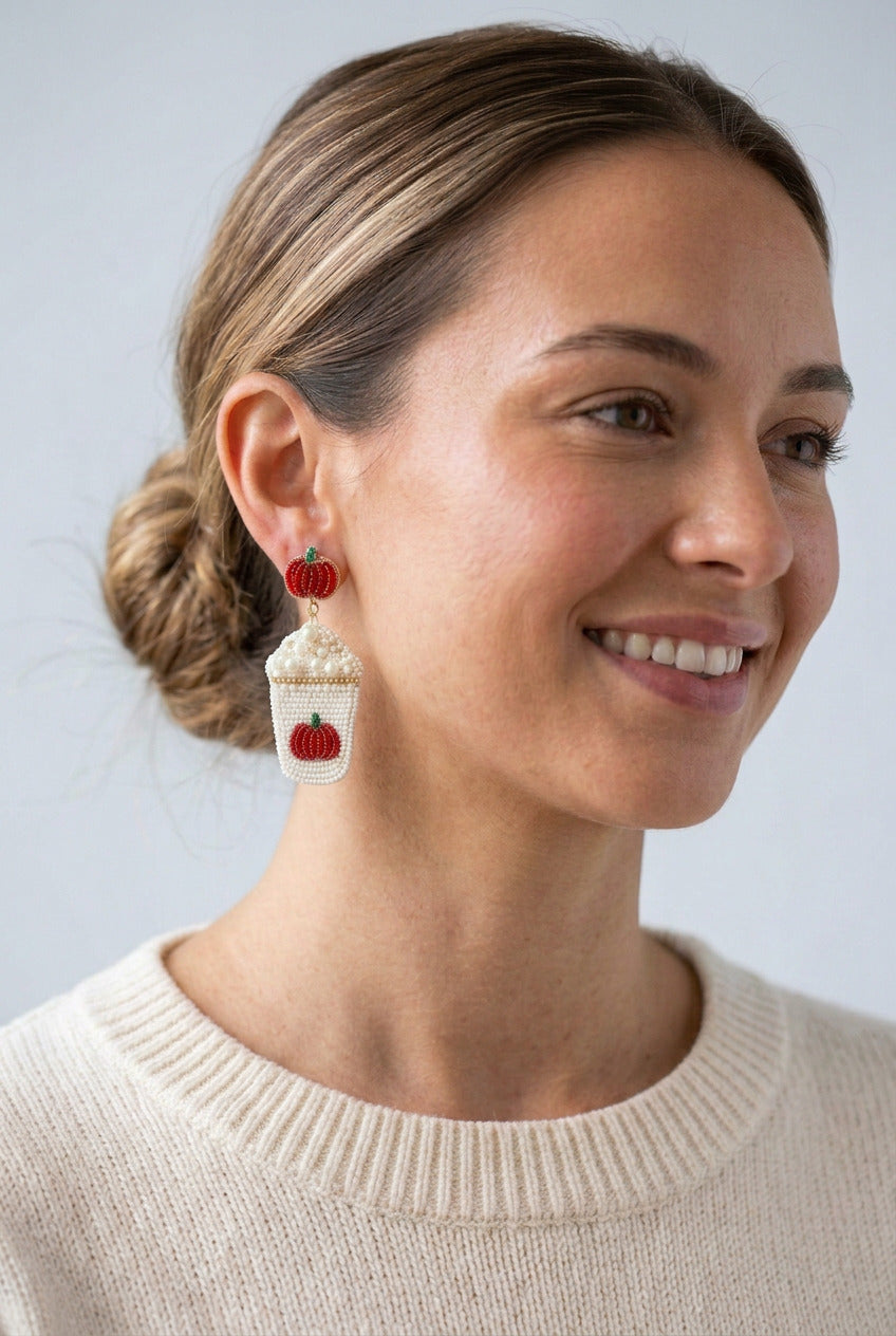 model wearing hand Beaded Pumpkin Coffee Earrings, Fall Thanksgiving Jewelry