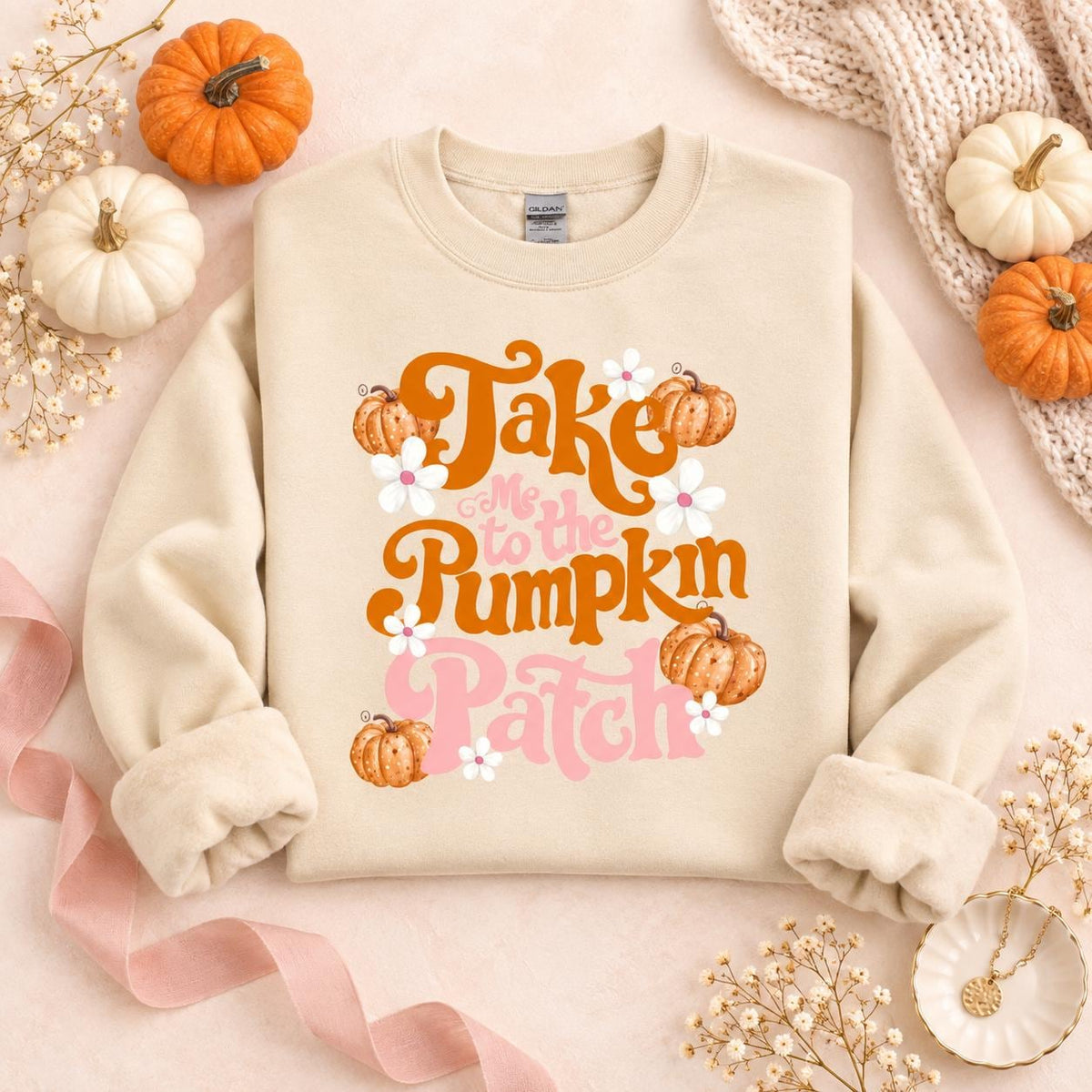 Sand crewneck sweatshirt with colorful Take Me To The Pumpkin Patch graphic design