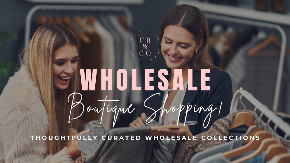 Two women smiling and browsing clothing racks in a boutique, with large overlaid text reading 'WHOLESALE Boutique Shopping!' and a circular 'CB & CO' logo at the top center.